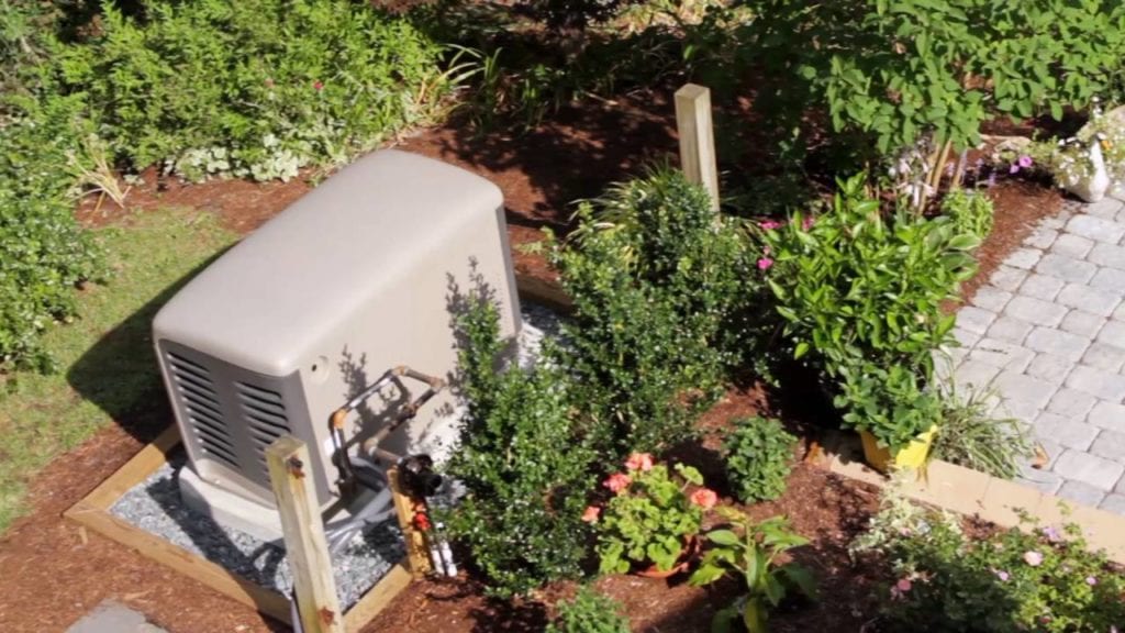 Kohler whole house generator in a home's backyard